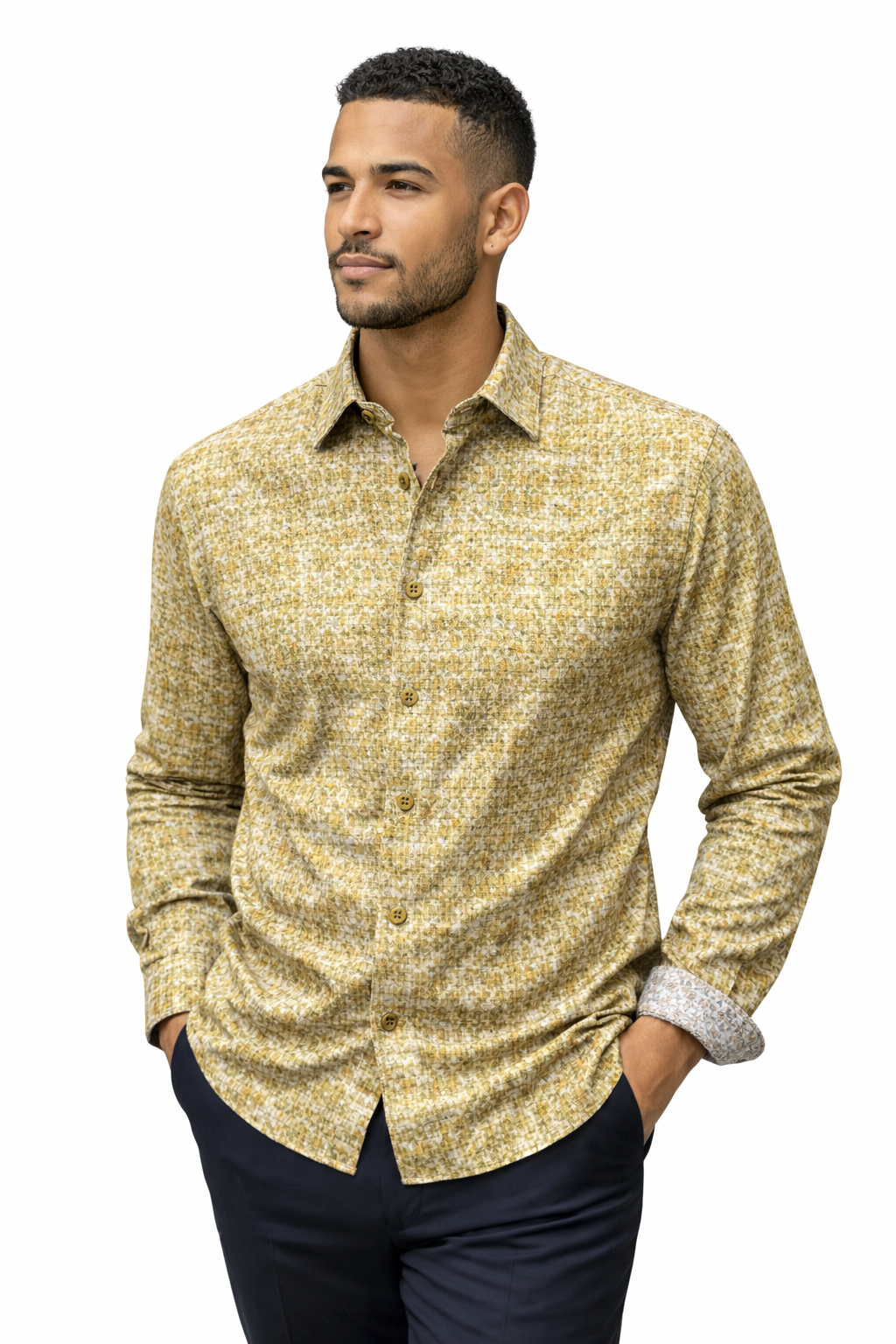 Man wearing a patterned yellow shirt on a white background