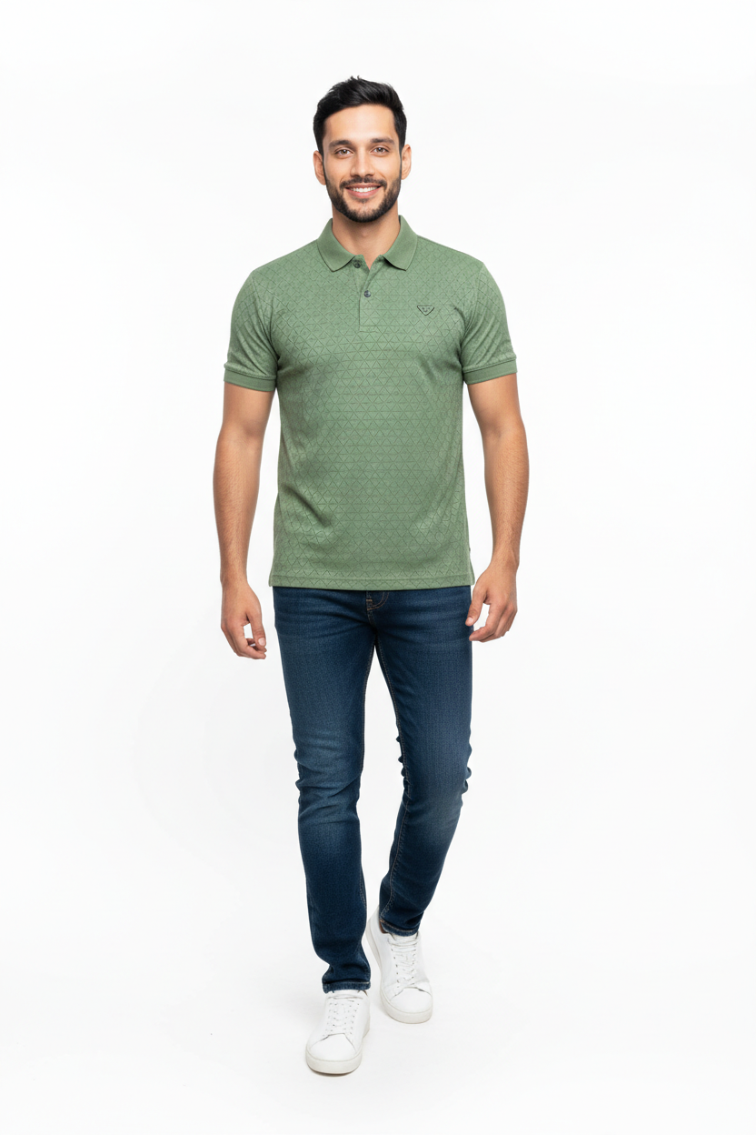 Man wearing a green polo shirt and blue jeans on a white background